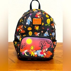 Disney loungefly Winnie the Pooh Halloween backpack, glows in the dark